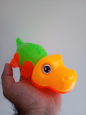 Mechanical crocodile toy used with light