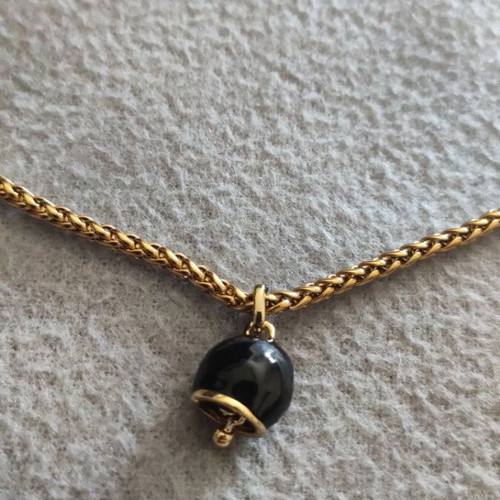 Bell necklace new, black and gold