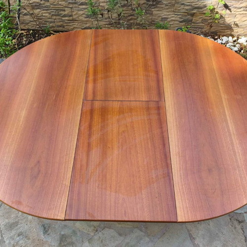 Wooden extendable round dining table used