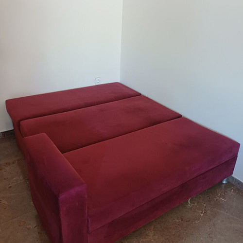 Corner sofa bed like new, burgundy with storage and cushions