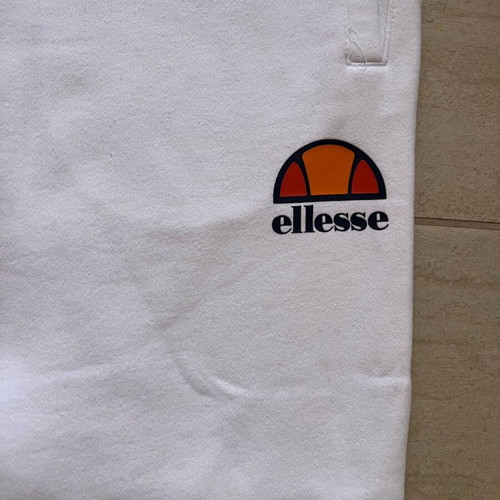 Ellesse white sweatpants like new, slim fit