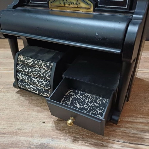 Piano music box used with compartments for small jewelry plastic
