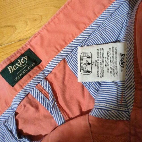 Men's bermuda shorts used coral color, size M