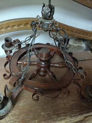 Chandelier made of wrought iron like new, rustic style with wood