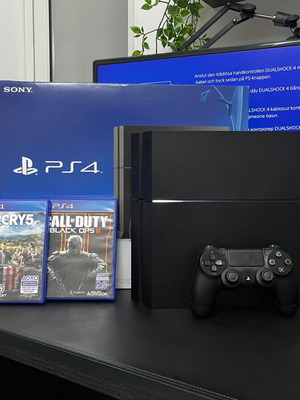 PlayStation 4 500GB console used with 2 games and Dualshock 4 controller