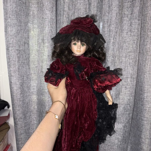 Vintage porcelain doll with velvet details, new