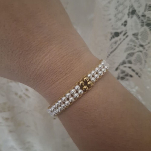 Woven bracelet with white pearls and gold hematite