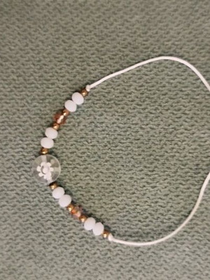 Bracelet with adjustable cord like new, white