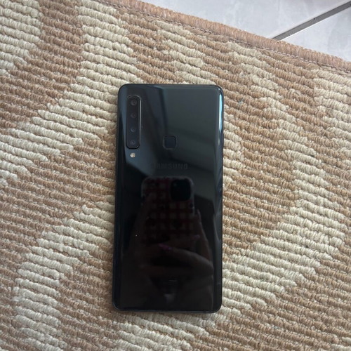 Samsung Galaxy A9 used with case and 4 screen protectors