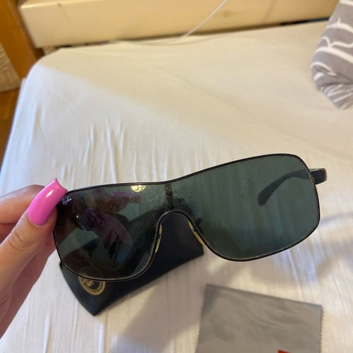 Rayban men's sunglasses used with small circular scratches