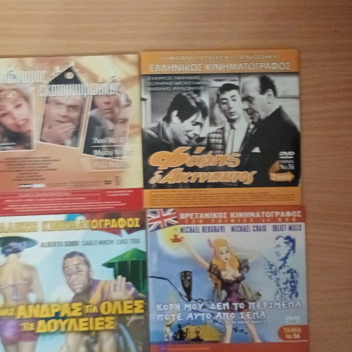 DVD set of 8 movies, like new, 4 double cases