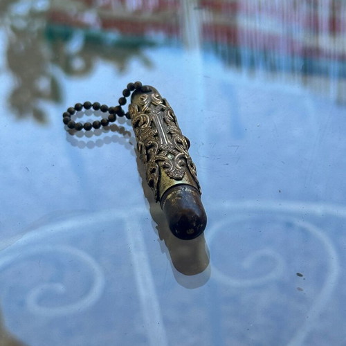 Vintage decorative pen with metal case and red stone used