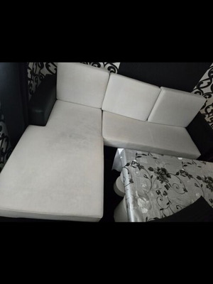 Extendable leather sofa used, white and black