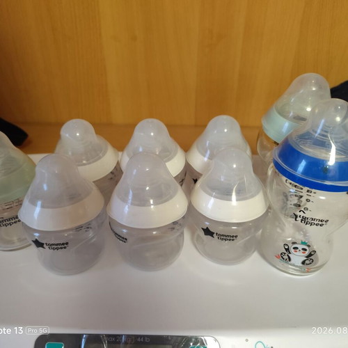 Tommee Tippee baby bottles, 6 plastic and 3 glass