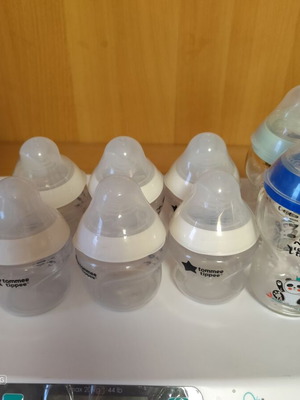 Tommee Tippee baby bottles, 6 plastic and 3 glass