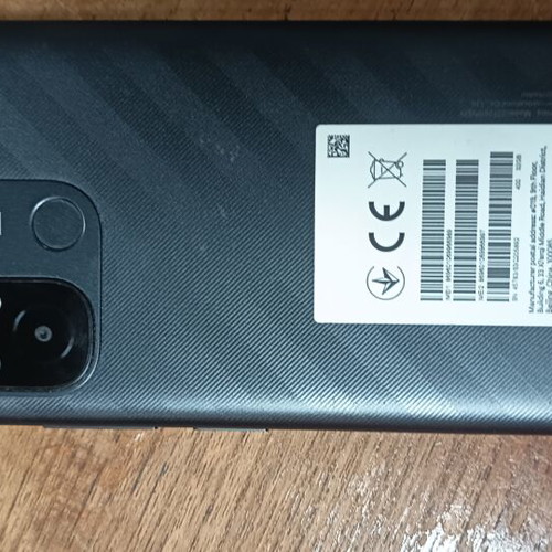 Redmi 12C smartphone used with gift headphones, dual SIM, 32GB
