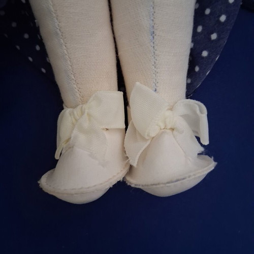 Vintage Slavic doll with porcelain head and fabric body