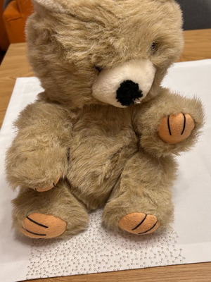 Stuffed teddy bear like new, about 25 centimeters