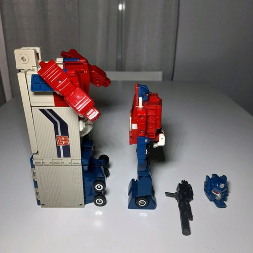 Optimus Prime used toy with missing parts