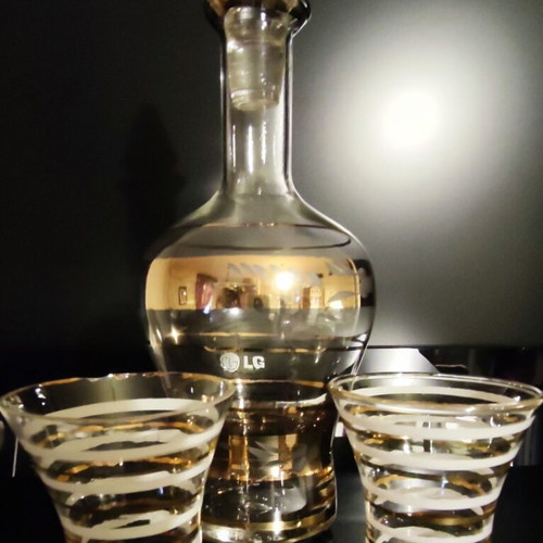 Vintage glass decanter set with 2 glasses used, gold decorations
