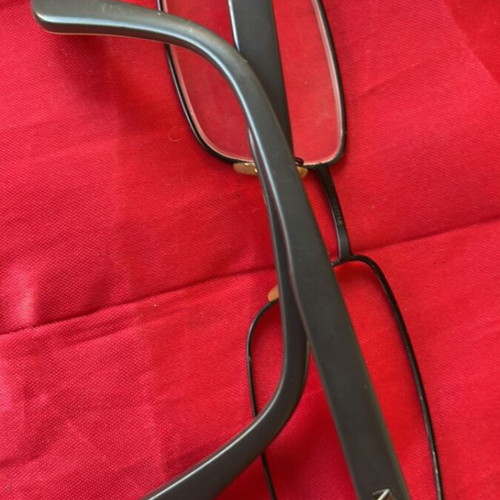 Vogue eyeglass frame like new with black and printed design