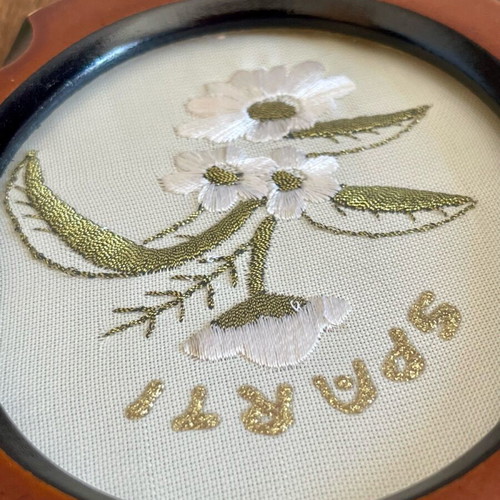 Wooden embroidered plaque used with Sparta theme