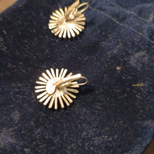 Earrings used, silver color