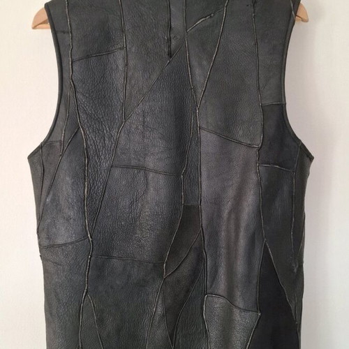 Leather sleeveless vest black with fur lining like new