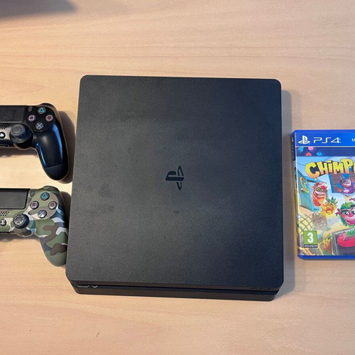 PS4 Slim 500GB console with 2 DualShock 4 controllers and Chimparty game