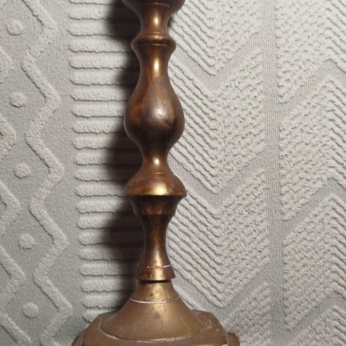 Brass vintage candlestick used with natural oxidation