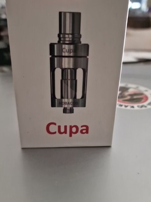 Nobacco Cupa electronic cigarette atomizer used, silver stainless steel