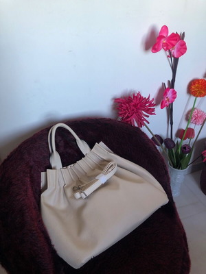 Large cream-beige handbag used with shoulder strap