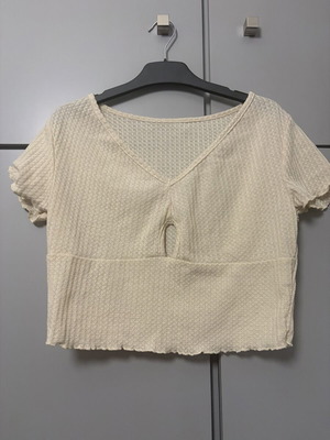 Women's cream crop top with V-neck and keyhole cut-out