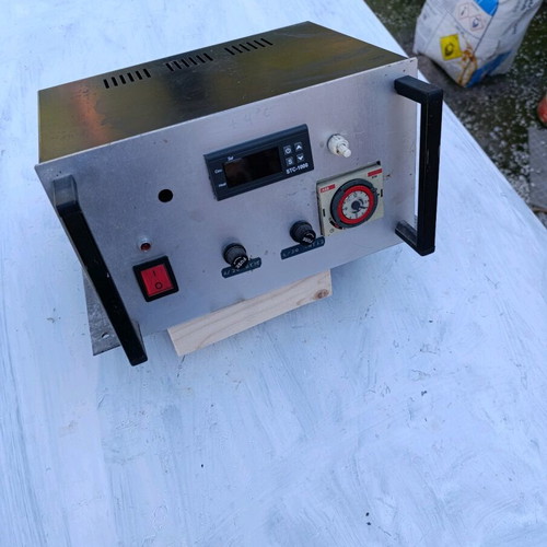 Incubator control panel used with thermometer and components