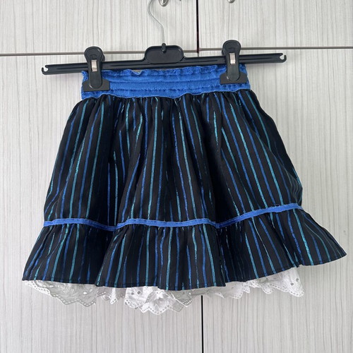 Girls' skirt used, black fabric with blue metallic stripes and lace, 4-5 years
