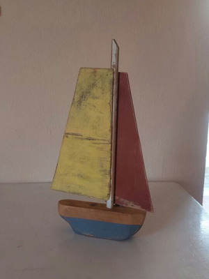 Decorative wooden sailboat new, made from old wood and metal