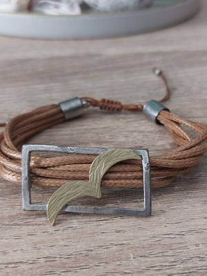 Bracelet with metal design, like new, brown and silver tones