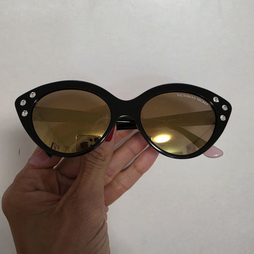 Sunglasses Victoria's Secret like new, gold mirror lenses, black frame