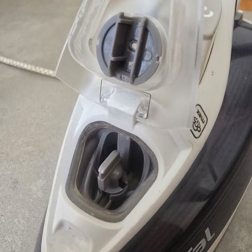 Tefal iron used with side crack and tip damage, functional