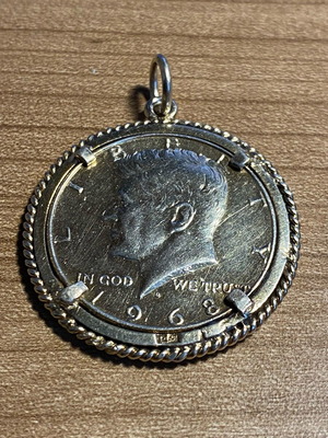 Collectible pendant large 1968 half dollar coin with silver wreath, like new