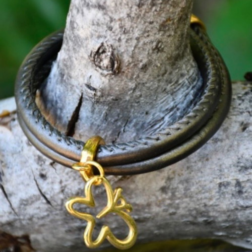 Handmade bracelet with synthetic cord and steel motif