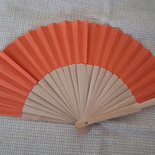 Fan refurbished with wooden base and orange fabric
