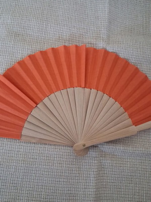 Fan refurbished with wooden base and orange fabric
