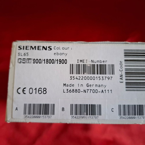 Siemens SL65 Ebony collectible cell phone used with packaging and accessories