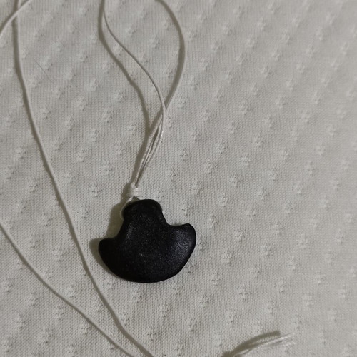 Jewelry pendant with leather cord