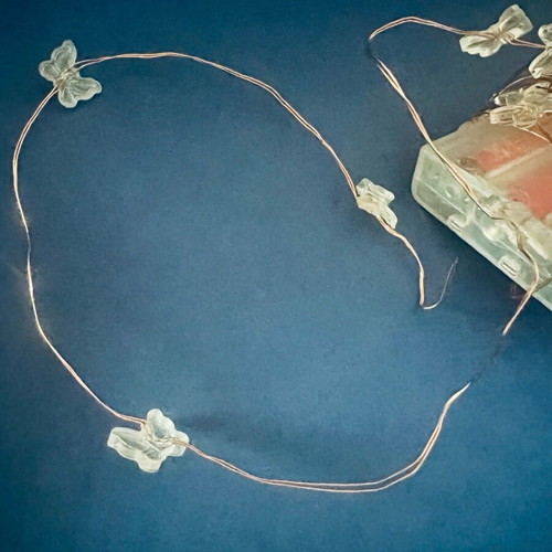 Decorative fairy lights with batteries like new, butterfly shape