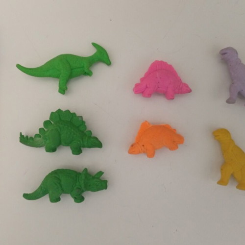 Vintage rubber dinosaur figures set used, 1980s monochrome erasers