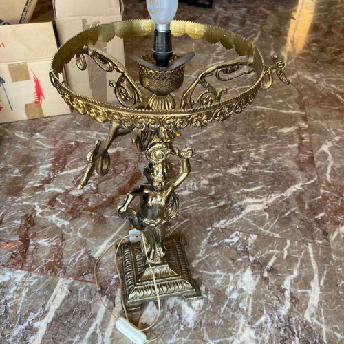 Vintage bronze table lamp with cherub design, baroque style