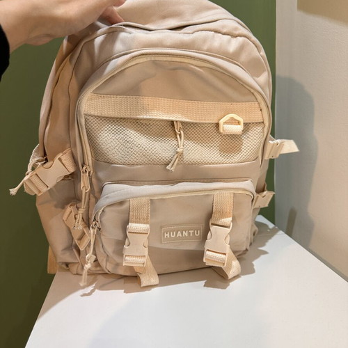 Beige travel bag backpack, used