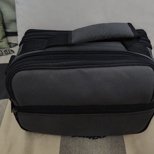 Nikon camera bag like new with shoulder strap and multiple compartments